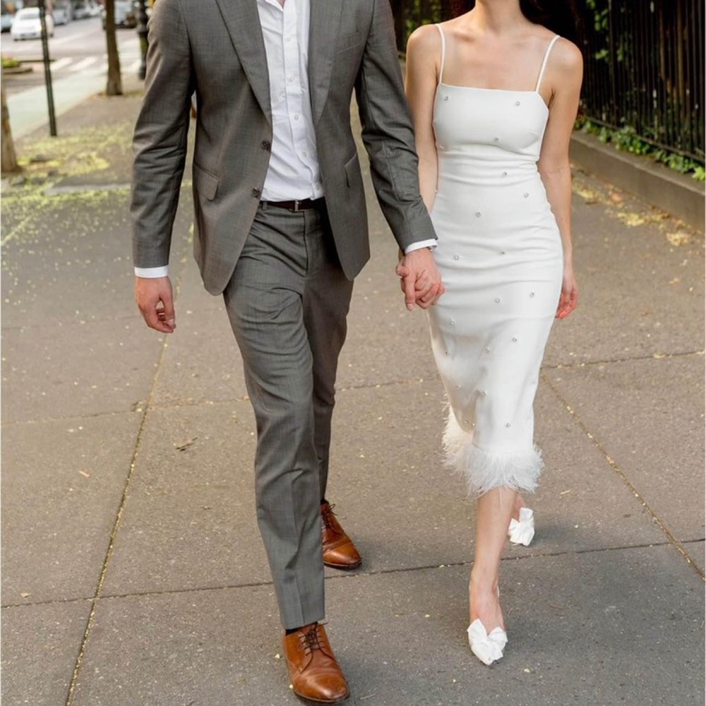 White Midi Electra Likely Dress. Embellished with feather trim.